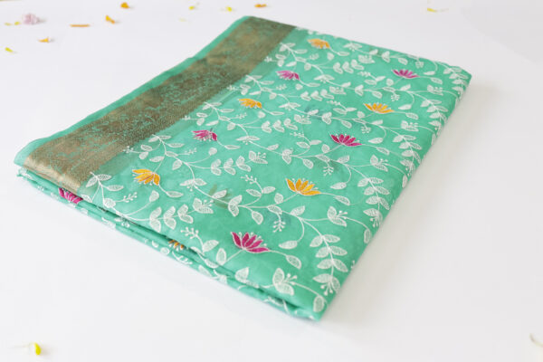 Elegant Aqua Green Silk Saree with Floral Embroidery & Golden Zari Border – Fancy Saree
